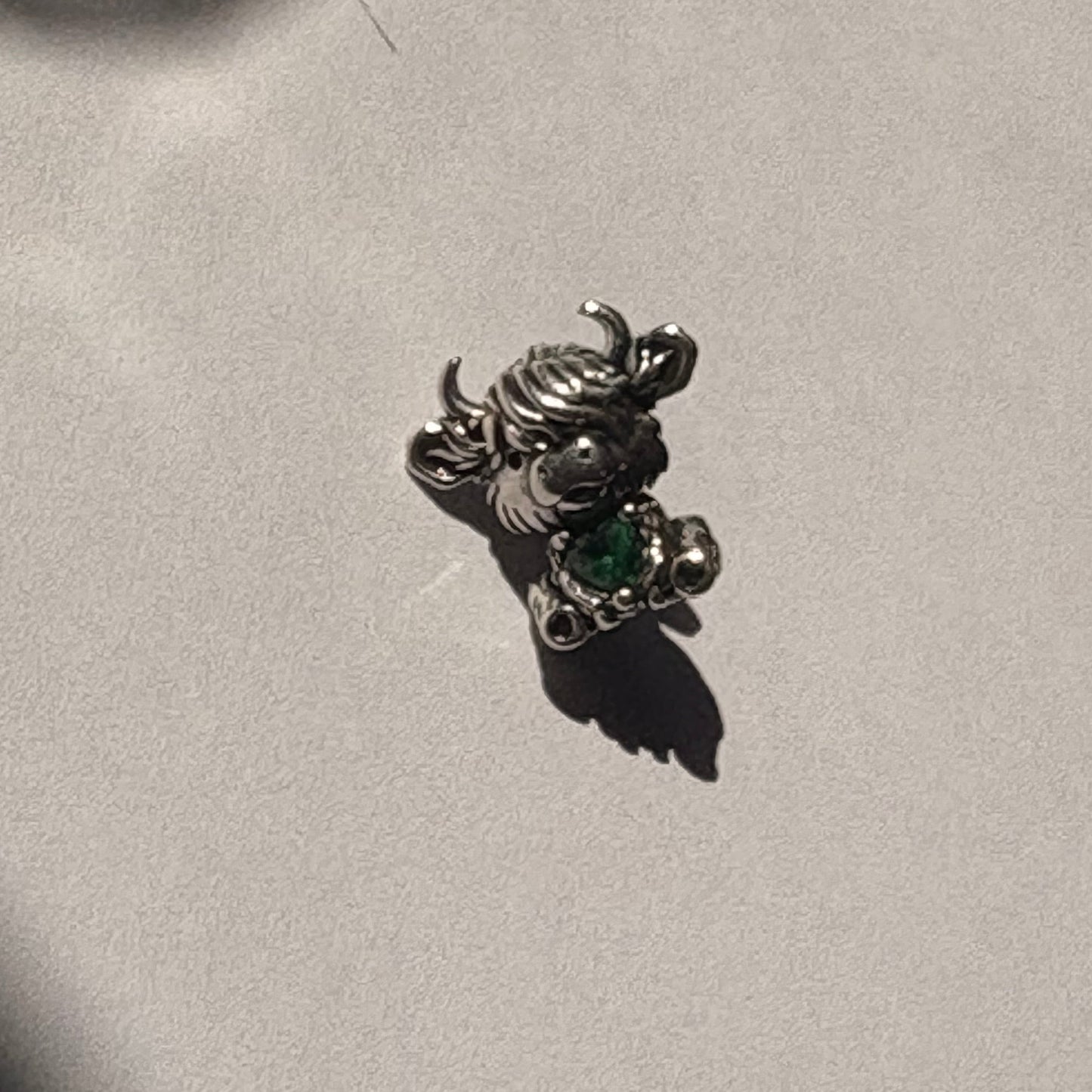 Silver highland cow charm side view