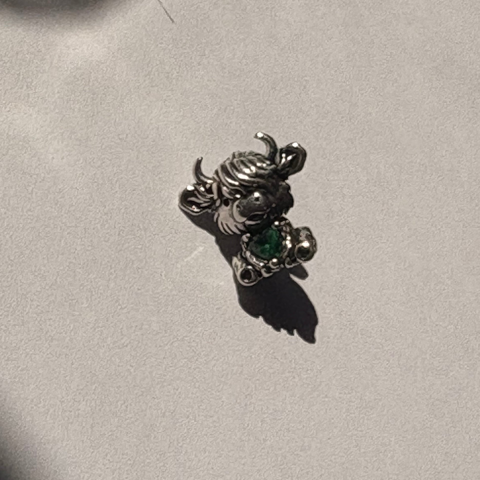 Silver highland cow charm side view