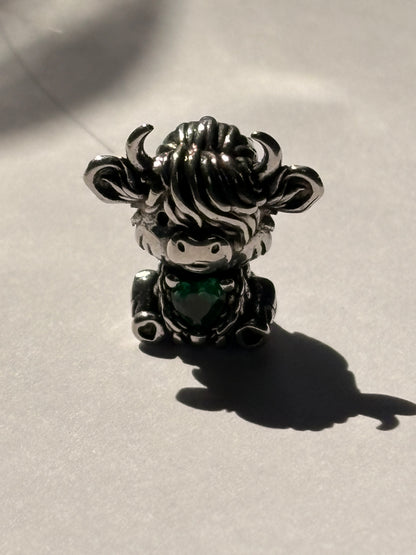 Silver highland cow charm close up detail