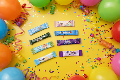 Wrappers in fan layout on rainbow party background