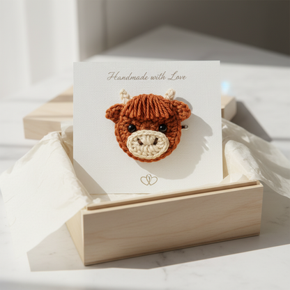 Crochet highland cow face on white background